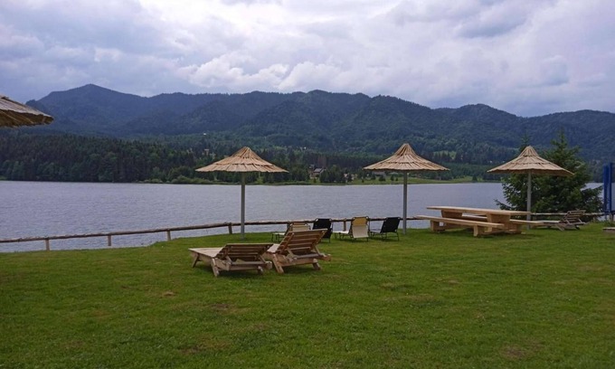Colibita Apartment | Incredible room with lake view at Lake Colibita, next to the lake.