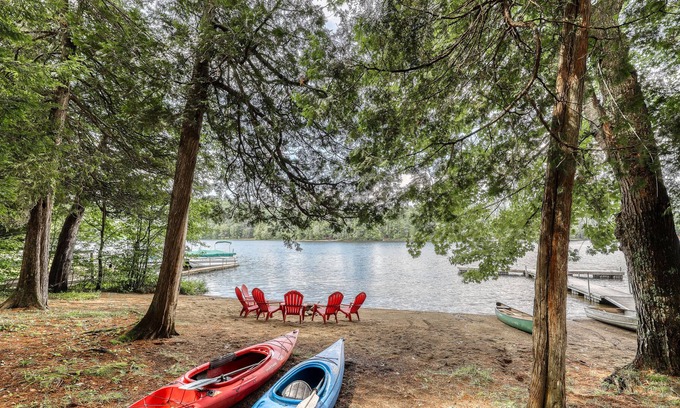 Adirondack House | Inviting lakefront house with dock, sandy beach & screened porch