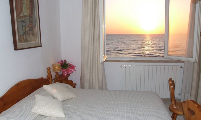 Marina di Castagneto Carducci Apartment | Flat directly by the sea, with stunning views from the terrace