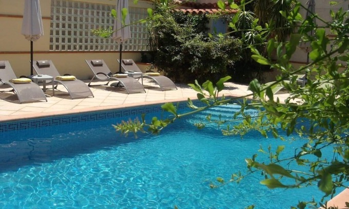 Espira de l'Agly Apartment | Ivy covered stone Mas part of an 18th century former convent.