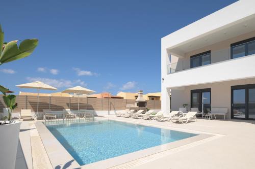 Panormos Villa | Jako Villa, a few meters away from the beach, By ThinkVilla