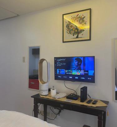 Ermita Night District Apartment | JFS Home at Birch Tower