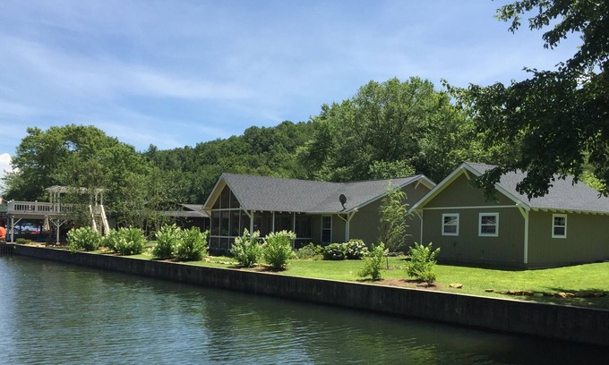 Wiley House | Jump into Lake Burton right out the back door of this water front home!