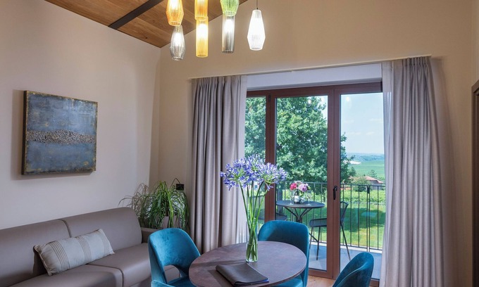Guarene Bed & Breakfast | Junior suite 103 with balcony - Relais PQlin & Winery.