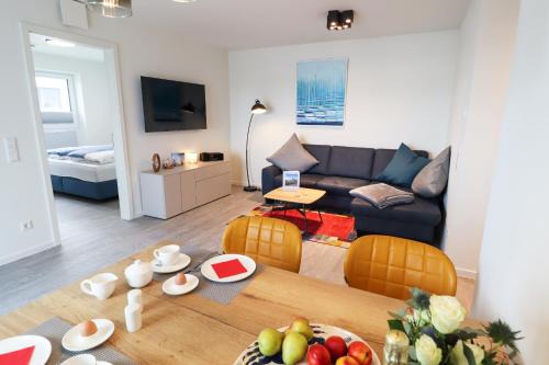 Tossens Apartment | KÜSTE33/38 - strandnah mit Sauna & Balkon direkt an der Küste!