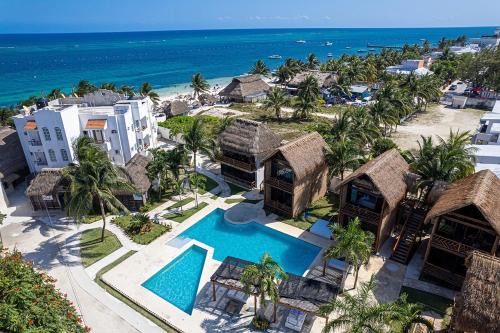 Puerto Morelos Hotel | Kabañas Ojo de Agua