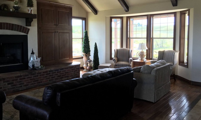 Yakima House | King bed in a room with a full bath in our home; a country setting with a view.