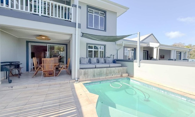 Knysna Apartment | Kloof Gardens: Pool & Braai with Lagoon Views