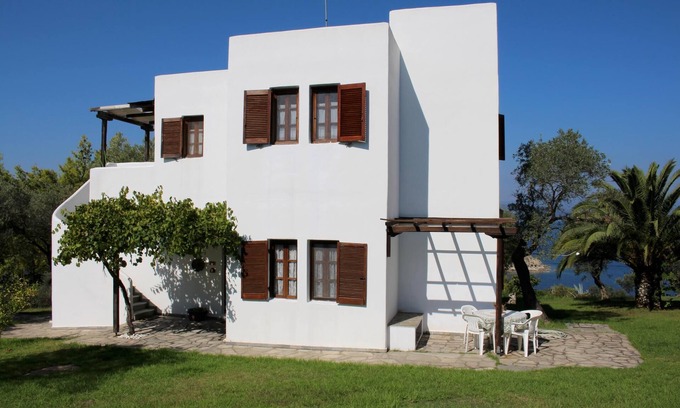 Sithonia Apartment | Komfortable holiday apartment with unique view, directly at the sea, Wifi, Ormos