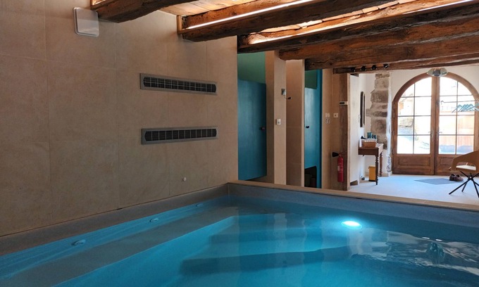 Castelnau-Pegayrols House | La Clé Des Sens' vacation home with mountain views, private terrace and indoor pool.
