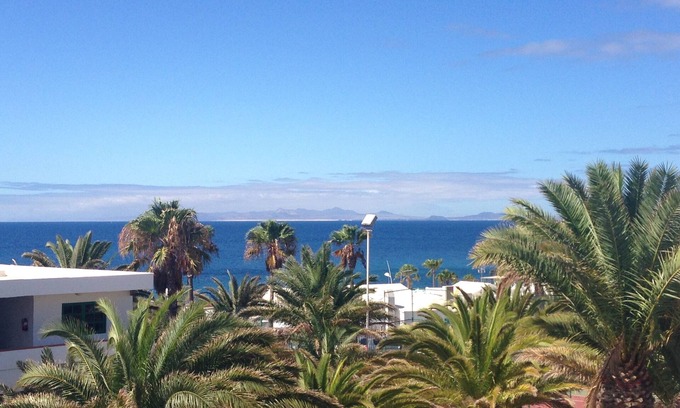 Puerto del Carmen Apartment | La Penita - Comfortable apartment with sea view in prime location