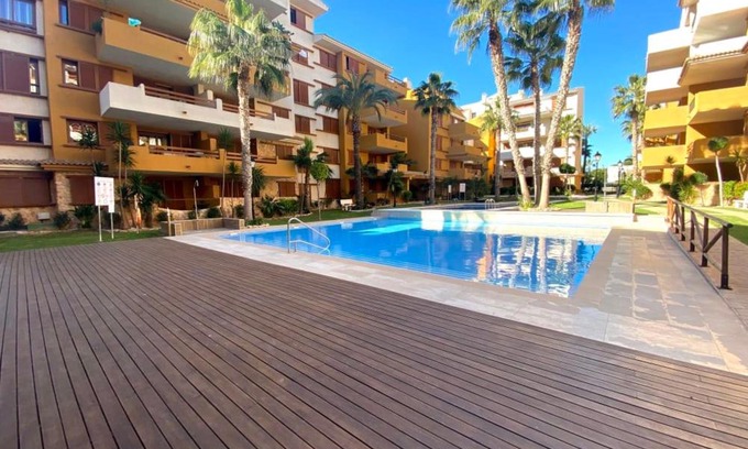 Punta Prima Apartment | LA RECOLETA - Punta Prima Ground Floor Pool View