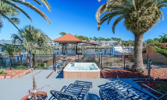 Silver Sands House | Lagoon Hideaway | Waterfront 4BR Home, Pool, Dock, Game Room, Short Walk to Beac