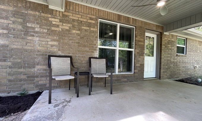 Hawkins House | Lake house getaway on quiet Lake Hawkins with lake access and boat pier.