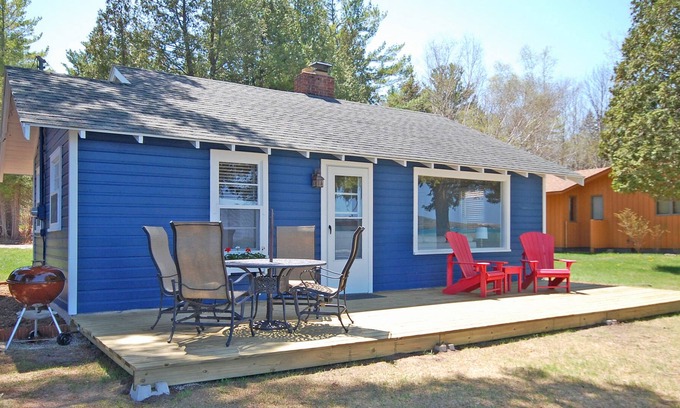 Glen Arbor Cottage | Lakefront cottage with amazing views, a spacious deck, grill, cable & dock