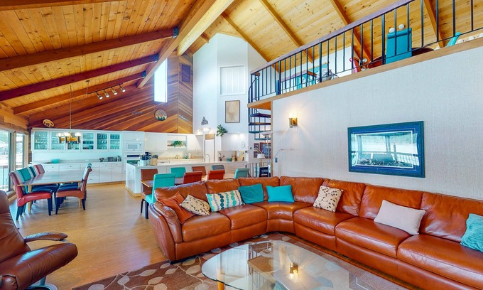 Bass Lake House | Lakefront home w/recreation room, hot tub, central AC, WiFi, private dock, & W/D