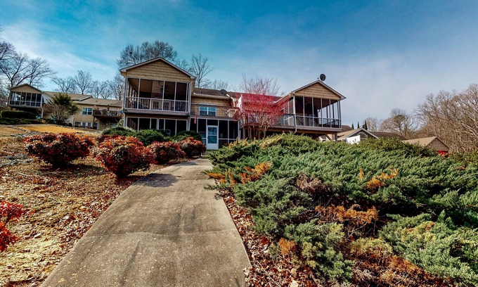 Seneca House | Lakefront home with private dock, boat lift, screened porches, deck, grill, W/D