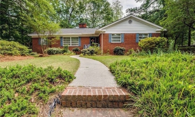 Lumberton House | Large charming 4 bedroom, 3 bath on quiet wooded lot with lots of space for all!