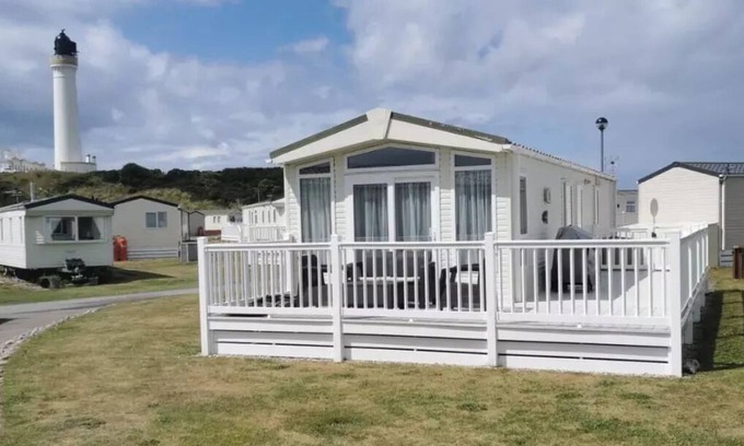 Lossiemouth House | Large Decking 5 Minute Walk to the Beach. explore the Scottish Highlands