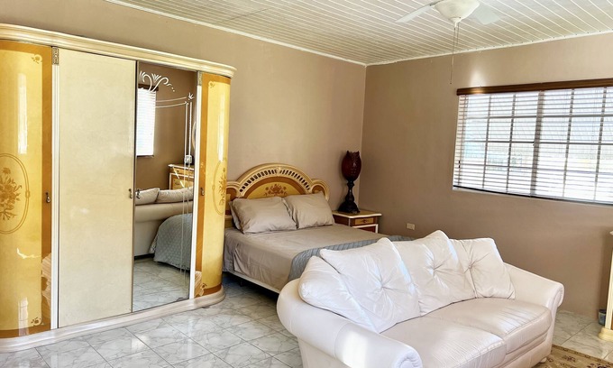 Salt Gut Apartment | Large Deluxe Studio with Balcony 10 minutes drive to Ocho Rios Airport.