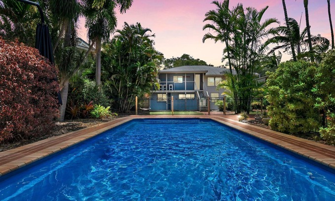 Urangan House | Large Waterfront Home With Pool - CoastHM