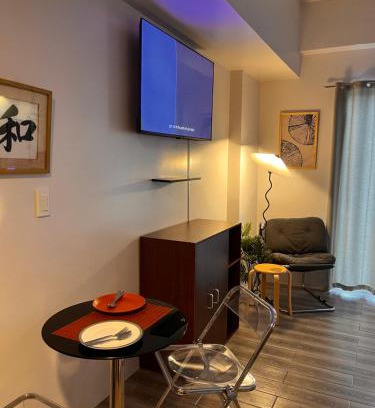 Mactan Export Processing Zone Apartment | Layover Stays 3 mins to Cebu Mactan Airport with Pool and Gym