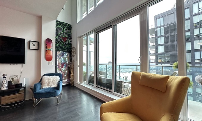 King West Village Condo | Liberty Village charm, vibrant community, and a spacious loft await your stay!