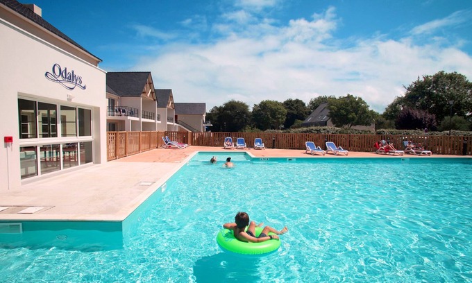 Baden Condo | Location proche de la Plage | Piscine Couverte