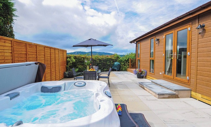 Low Newton Ski Chalet | Lodge with one king-size double with TV.