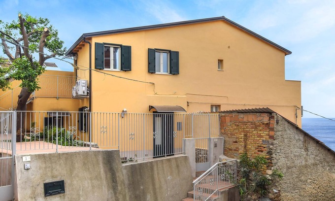 Scilla Apartment | Look forward to a beautiful view of the sea in this beachfront vacation rental.