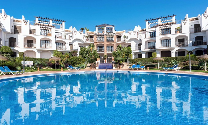 Benahavis Apartment | Los Arqueros sunny balcony with pool by Costarentals - Ref M52