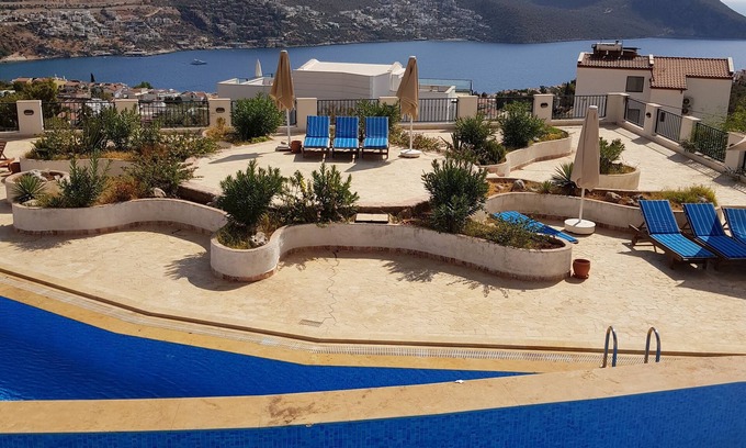 Kalkan Apartment | Lovely 2 bed 2 bath apartment semi private infinity pool and stunning sea views