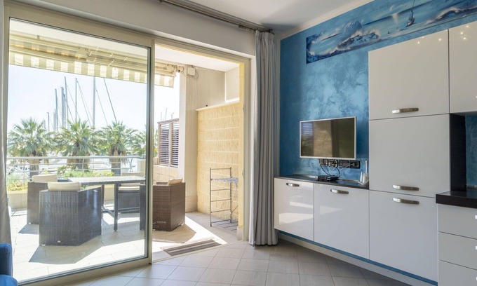 Santo Stefano al Mare Apartment | Lovely apartment for 4 guests with WIFI, pool, A/C and balcony