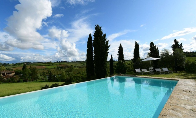 Quercegrossa Apartment | Lovely apartment for 3 people with WIFI, pool, A/C, TV, pets allowed and parking, close to Siena