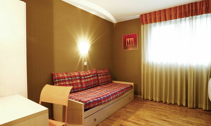Divonne-les-Bains Apartment | Lovely apartment for 6 guests with WIFI, hot tub, pool, A/C, TV, terrace, pets allowed and parking
