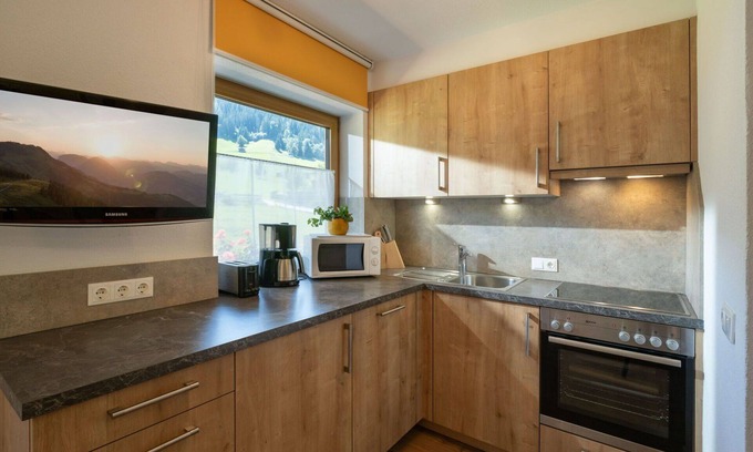 Niederau Apartment | Lovely apartment for 4 guests with WIFI, TV, balcony and parking