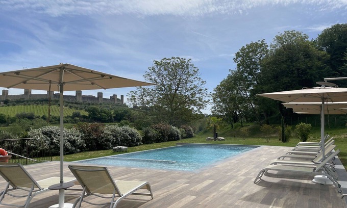 Monteriggioni Apartment | Lovely apartment for 2 guests with WIFI, A/C, pool, TV and pets allowed, close to Siena