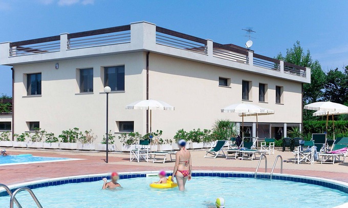 San Vincenzo Apartment | Lovely apartment for 6 people with WIFI, A/C, pool, TV, terrace, pets allowed and parking