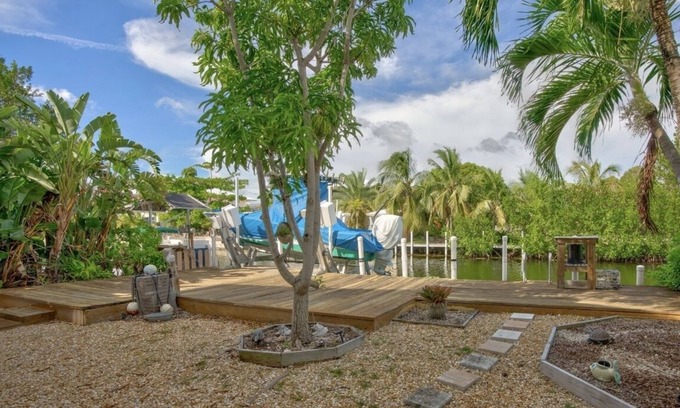 Eden Pines House | Lower Keys on quiet canal front w/boat lift, screened-in porch & Pets Welcome!