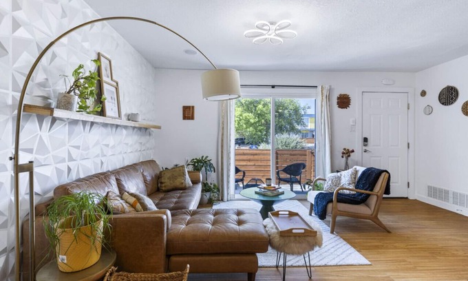St. Johns Condo | Luxe 2BR Retreat with Home Theater Espresso and Parking
