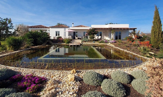 Olhao House | Luxurious vacation home with natural pool and sea view