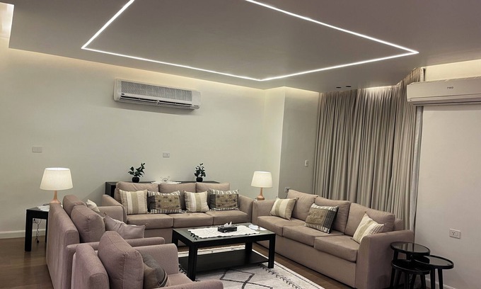Al Duqqi Apartment | Luxury 3-bedroom apartment in Mohandseen with AC, WiFi