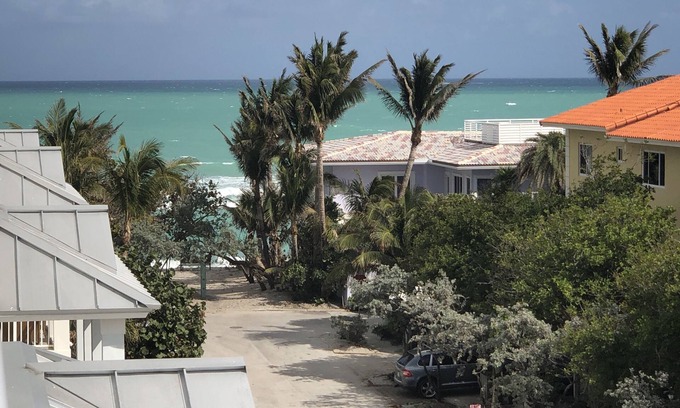 North Beach House | Luxury Beach Villa with Private Rooftop Pool & Elevator, Steps to Tranquil Beach