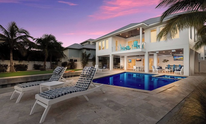 Anna Maria House | Luxury Canalfront Retreat with Dock, Pool, Spa and Game Room