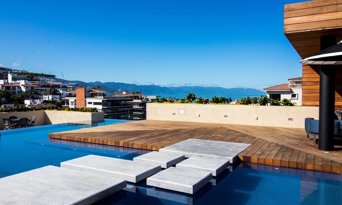 Emiliano Zapata Condo | Luxury condo steps to the boardwalk and the beach in the Romantic Zone