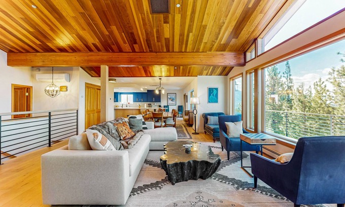 Round Hill Village House | Luxury lake-view home with spacious deck, sauna, golf room, & wet bar