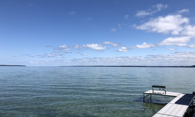 Traverse City House | Majestic Views of West Bay and OMP. Remodeled Waterfront Home. Awesome Location.