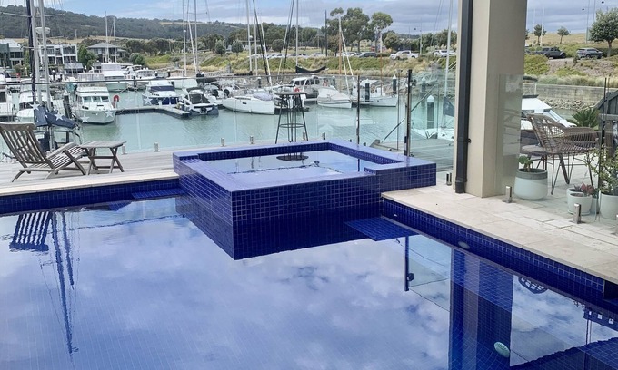 Safety Beach House | Marina-side Home with Pool and spa for magical Family Holiday. Sleeps 11