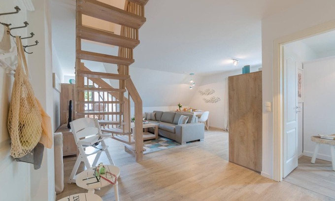 Zingst Apartment | Maritime maisonette with balcony, garden, sauna house and only 300m to the beach.