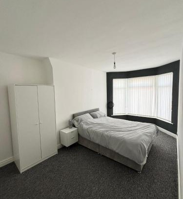 Anfield House | Master bedroom in Anfield